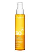 Glowing Sun Oil High Protection Spf30 Body & Hair Solcreme Krop Nude Clarins
