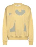 Leiot Unikko Placement Tops Sweatshirts & Hoodies Sweatshirts Yellow Marimekko